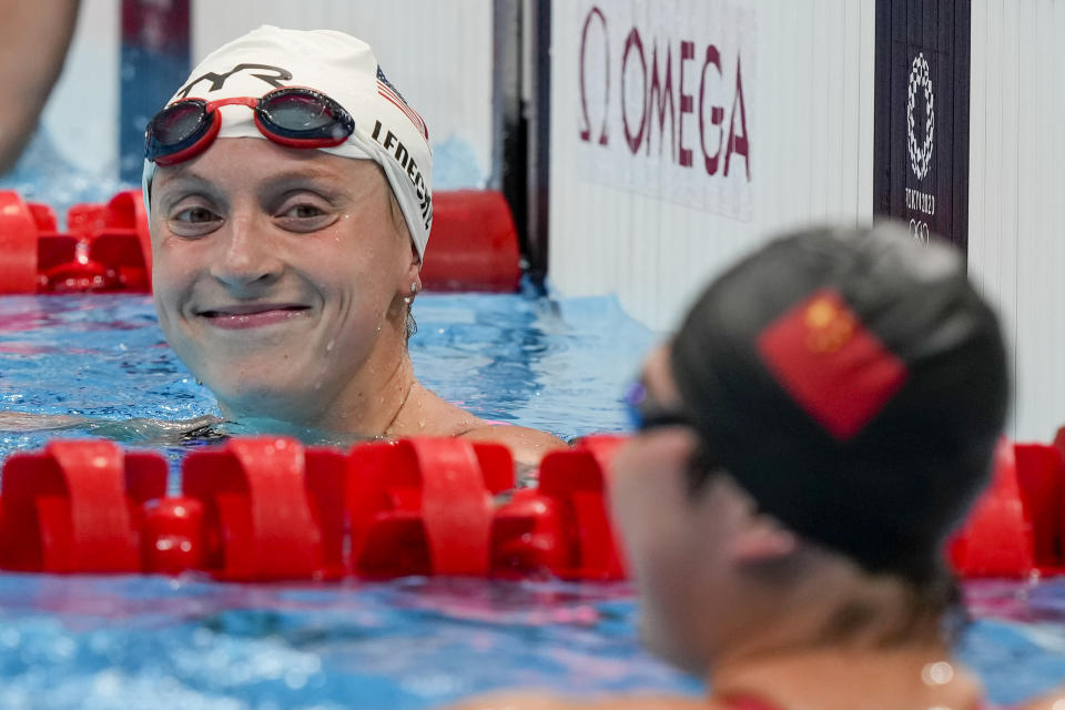 Katie Ledecky, of the United States, reacts following her swim in a heat of the women's 1500-meter freestyle at the 2020 Summer Olympics, Monday, July 26, 2021, in Tokyo, Japan. (AP Photo/Martin Meissner)