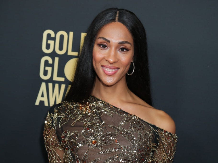 Mj Rodriguez at the Golden Globes wearing an off-the-shoulder dress