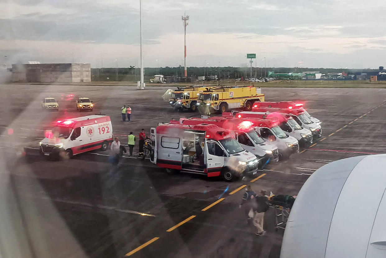 Ambulances next to an Air Europa Boeing 787-9 Dreamliner after it made an emergency landing in Natal, in northern Brazil, on July 1, 2024, after hitting strong turbulence on its way from Madrid to Montevideo.  (Claudio Fernandez Arbes / AFP - Getty Images)