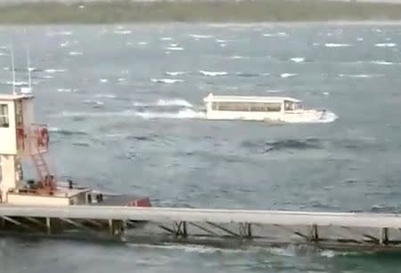 FILE PHOTO: A duck boat is seen at Table Rock Lake in Branson, Missouri, U.S., July 19, 2018 in this picture grab obtained from social media video. Ron Folsom/via REUTERS