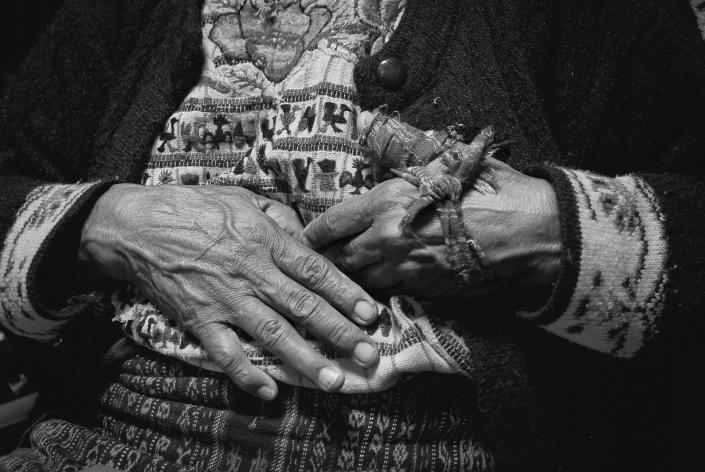 <p>Elena Mendoza after being treated for arthritis in her hands by the bonesetter. (Photograph by Fran Antmann) </p>