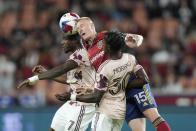 Real Salt Lake defender Justen Glad (15) competes against Portland Timbers' Santiago Moreno (30) and Franck Boli (7) during the first half of an MLS soccer match Wednesday, May 17, 2023, in Sandy, Utah. (AP Photo/Rick Bowmer)