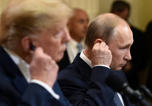 US President Donald Trump and Russia's President Vladimir Putin attend a joint press conference after meeting in Helsinki