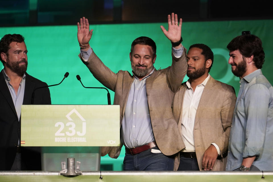 Santiago Abascal, leader of the far-right Vox party, waves to supporters outside the party headquarters following Spain's general election in Madrid, Sunday, July 23, 2023. Spain's conservative Popular Party is set to narrowly win the country's national election but without the majority needed to topple the coalition government of Socialist Prime Minister Pedro Sánchez. (AP Photo/Andrea Comas)