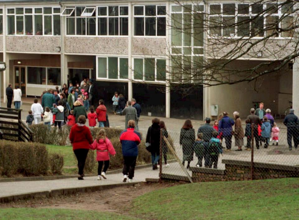 children return to Dunblane Primary School, nine days after a gunman killed 16 children, their teacher and himself in Dunblane, Scotland