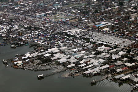 FILE PHOTO: An aerial view of a section of Nigeria's oil hub city of Port Harcourt, Nigeria July 7, 2010. REUTERS/Akintunde Akinleye/File Photo