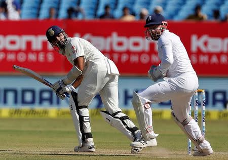 Cricket - India v England - First Test cricket match - Saurashtra Cricket Association Stadium, Rajkot, India - 11/11/2016. India's Murali Vijay plays a shot. REUTERS/Amit Dave