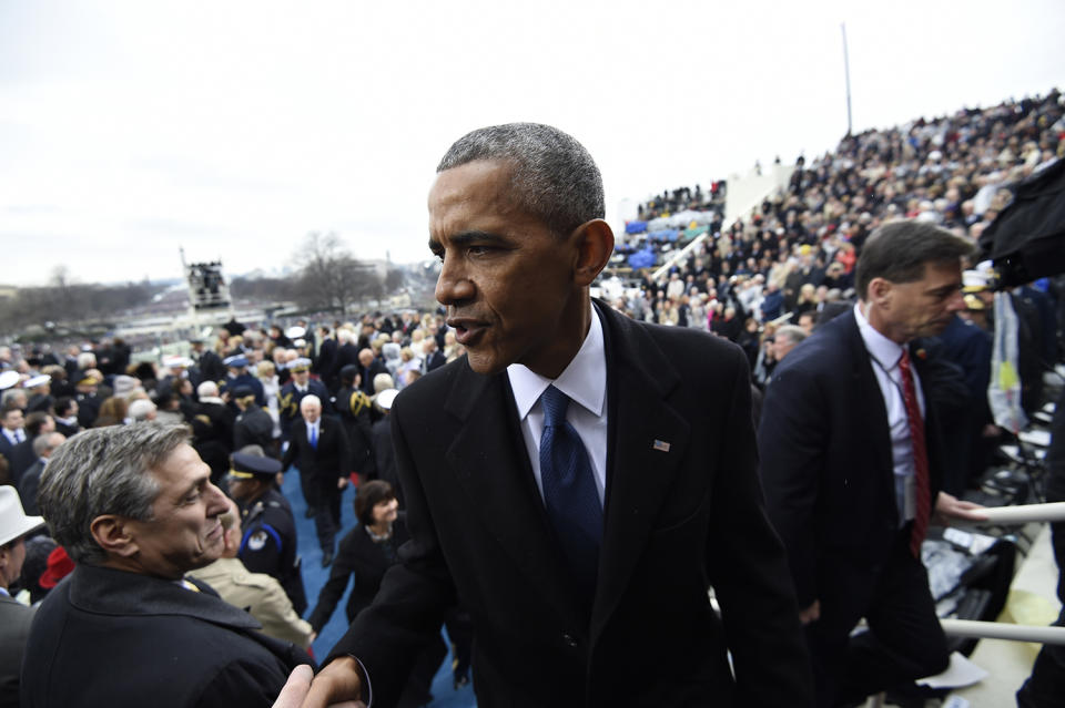 <p>Former President Barack Obama shakes hands as he leaves Capitol Hill in Washington, Friday, Jan. 20, 2017, after the Presidential Inauguration of Donald Trump. (Photo: Saul Loeb/Pool Photo via AP) </p>