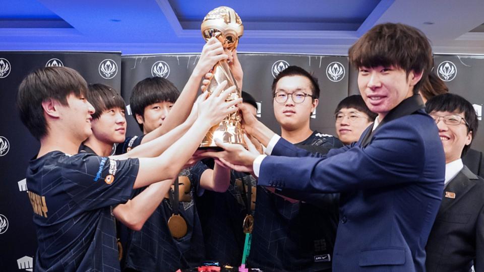Xiaohu (third from the right) has had a fruitful eight years with RNG, winning 3 back-to-back MSI titles, 6 LPL championships, and 6 other titles while with the organisation. (Photo: Riot Games)