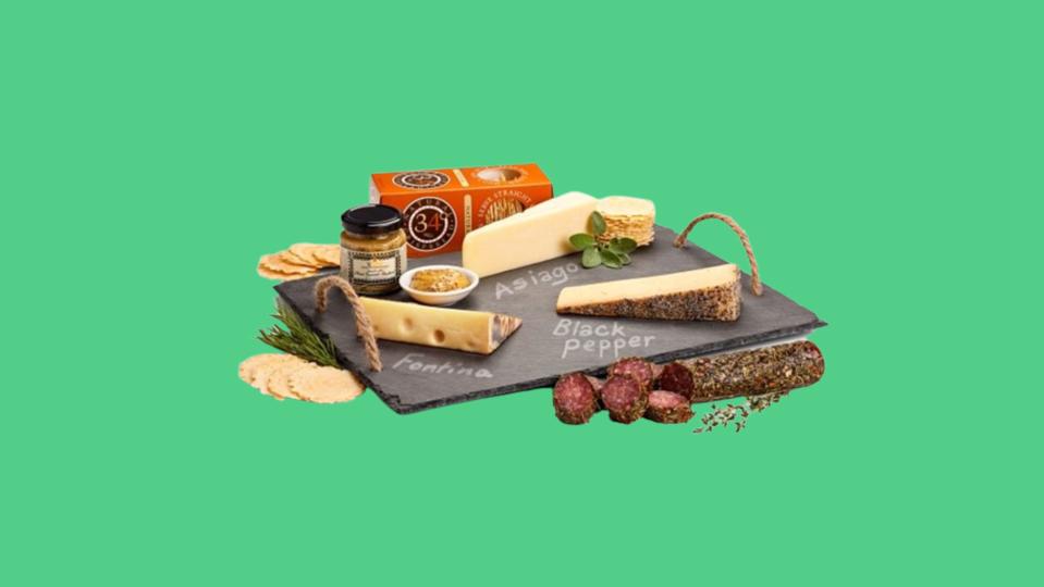 Best gifts for dads: Slate serving board with artisan cheeses