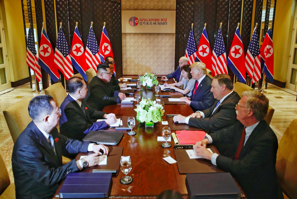 North Korean and US delegations sit together in Singapore last month (Picture: Rex)