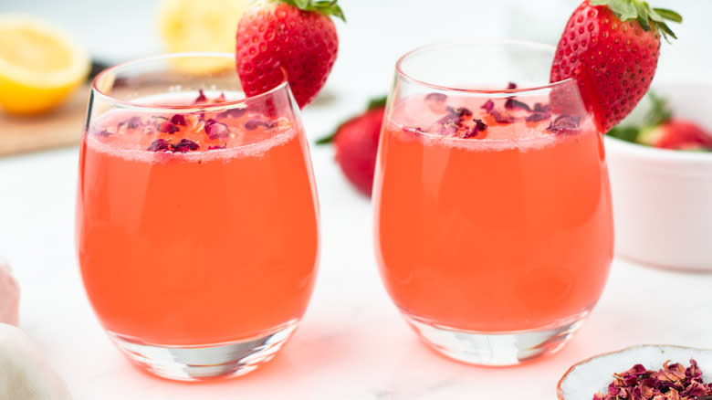 Two strawberry and rose cocktails