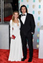 <p>Adam Driver opted for a traditional tux while Joanne Tucker wore a grecian-inspired gown. <em>[Photo: Getty]</em> </p>