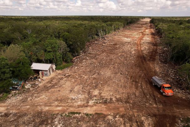 PHOTO: A house stands on the edge of forest which has been cleared for construction of section 5 of the new Mayan Train route, in Solidaridad, Quintana Roo, Mexico, November 6, 2022. (Jose Luis Gonzalez/Reuters)