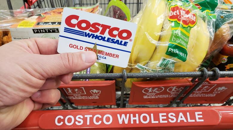 Costco membership card with groceries