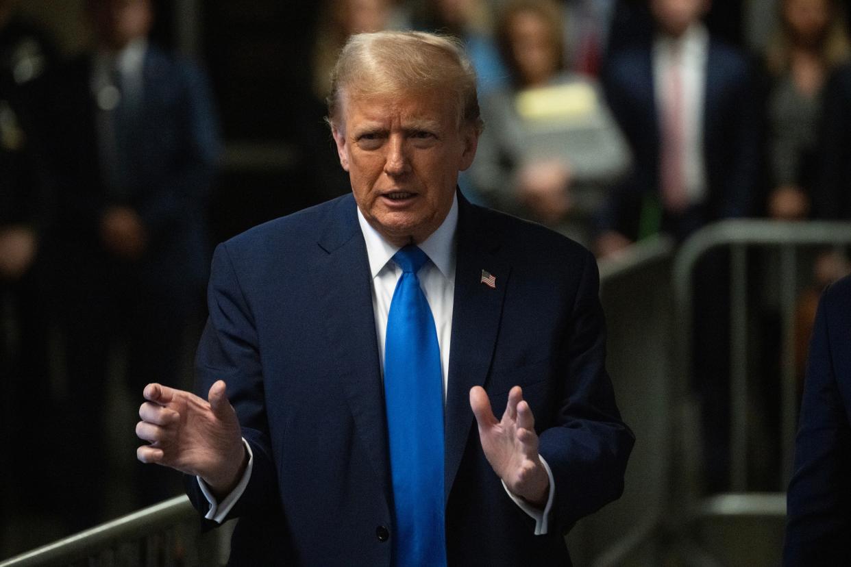 NEW YORK, NEW YORK - APRIL 22: Former U.S. President Donald Trump speaks to the media at the end of the day at Manhattan Criminal Court during his trial for allegedly covering up hush money payments on April 22, 2024 in New York City. Trump was charged with 34 counts of falsifying business records last year, which prosecutors say was an effort to hide a potential sex scandal, both before and after the 2016 presidential election. (Photo by Victor J. Blue - Pool/Getty Images)