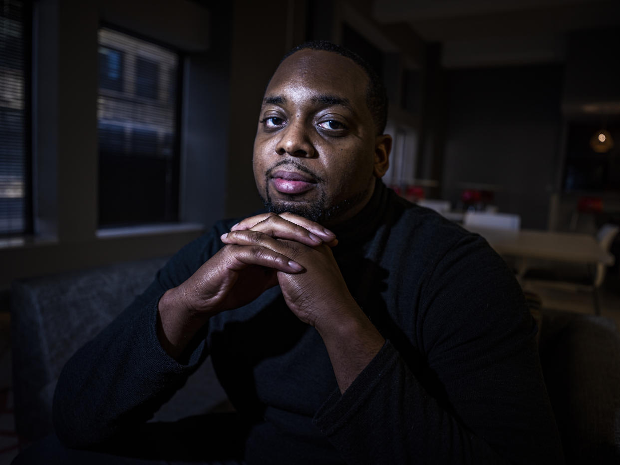 FILE - In this April 28, 2021 file photo, Brandon Mitchell, a juror in the trial of former Minneapolis police Officer Derek Chauvin for the killing of George Floyd, poses for a picture, in Minneapolis. Mitchell defended on Monday, May 3, 2021, his participation in protest in Washington last summer in the wake of online speculation about his motives for serving on the jury. (Richard Tsong-Taatarii/Star Tribune via AP File)