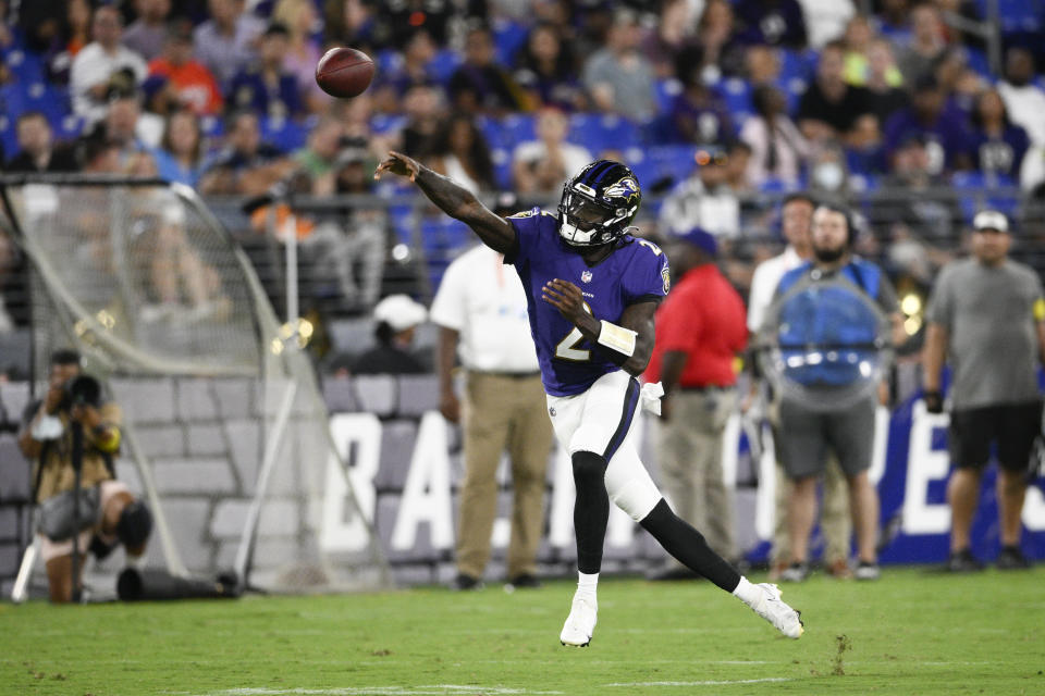 Baltimore Ravens quarterback Tyler Huntley throws a pass against the Tennessee Titans during the first half of a preseason NFL football game, Thursday, Aug. 11, 2022, in Baltimore. (AP Photo/Nick Wass)