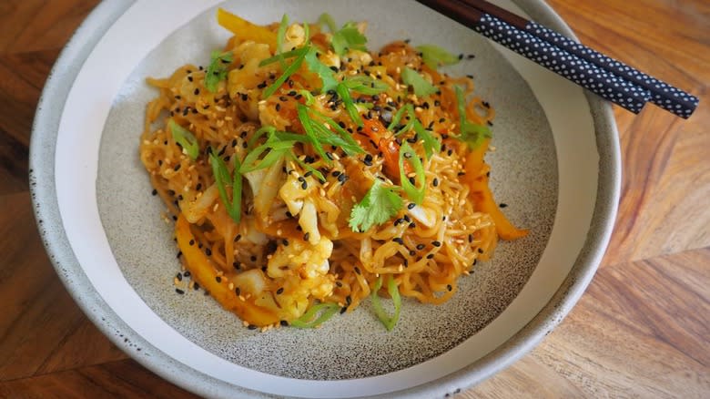 Noodle sitr fry with chopsticks