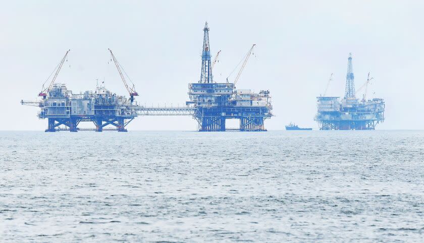 Drilling platforms Elly (L), Ellen (C) and Eureka (R) are seen off the southern California coast on October 6, 2021. - The US Coast Guard is investigating a possible anchor strike as the cause of a broken pipeline that has spewed tens of thousands of gallons of crude oil into the sea off California, media reported on October 5. (Photo by Frederic J. BROWN / AFP) (Photo by FREDERIC J. BROWN/AFP via Getty Images)