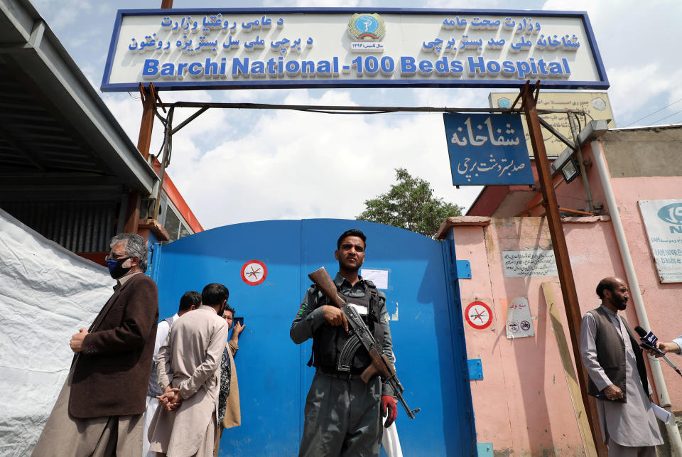 Image: An Afghan policeman keeps watch  (Omar Sobhani / Reuters)