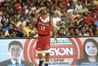 Manny Pacquiao, the playing coach of KIA-Sorento, reacts as he calls for a foul during the first quarter of a basketball match against the Blackwater-Elite during the 40th Season of the Philippine Basketball Association (PBA) games in Bocaue town, Bulacan province, north of Manila October 19, 2014. Pacquiao, a congressman and a world renowned boxing champion, ventured into the PBA as a playing coach on Sunday. Manny Pacquiao is scheduled for a title bout against Chris Algieri of the U.S. in Macau on November 22. REUTERS/Romeo Ranoco (PHILIPPINES - Tags: POLITICS SPORT BOXING BASKETBALL)