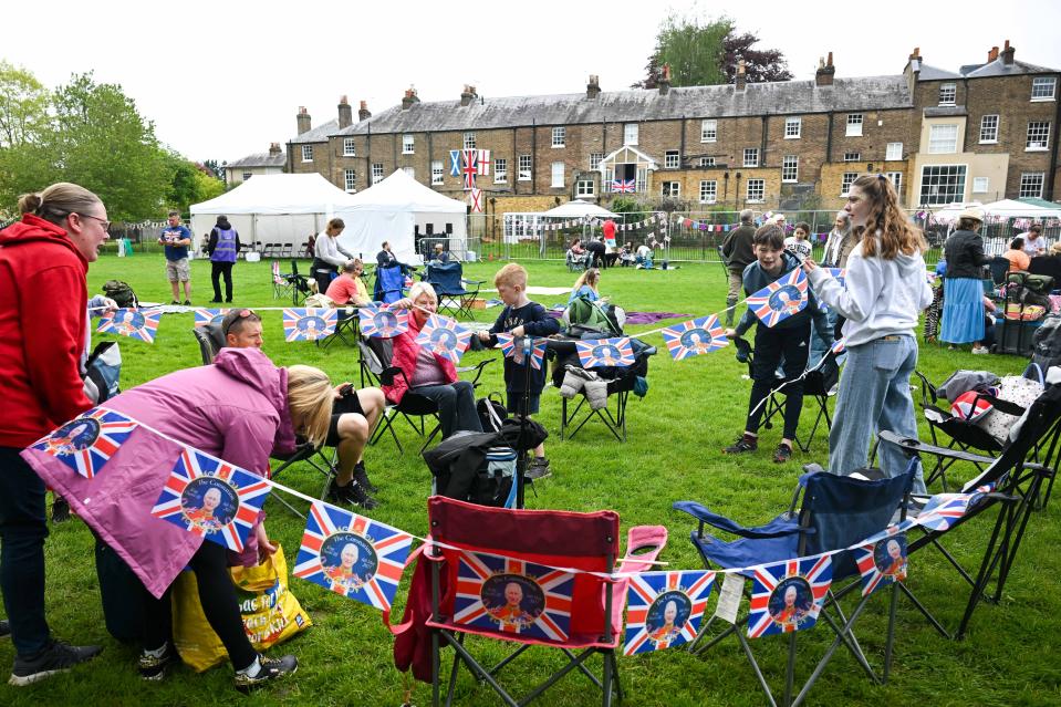 People set up for a Coronation Big Lunch event in Windsor on Sunday (Getty Images)