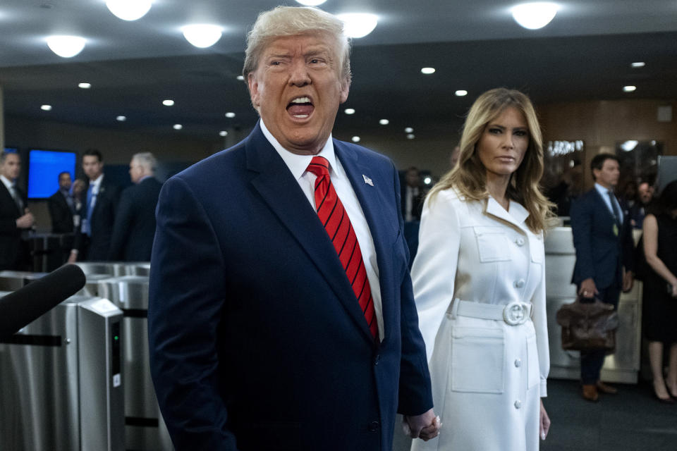 FILE - In this Sept. 24, 2019, file photo, President Donald Trump addresses reporters as he arrives with first lady Melania Trump for the 74th session of the United Nations General Assembly, at U.N. headquarters. As House Democrats quickly move forward with impeachment proceedings againstTrump, much remains unknown about how a Senate trial would a proceed, including what the charges would be. (AP Photo/Craig Ruttle, File)