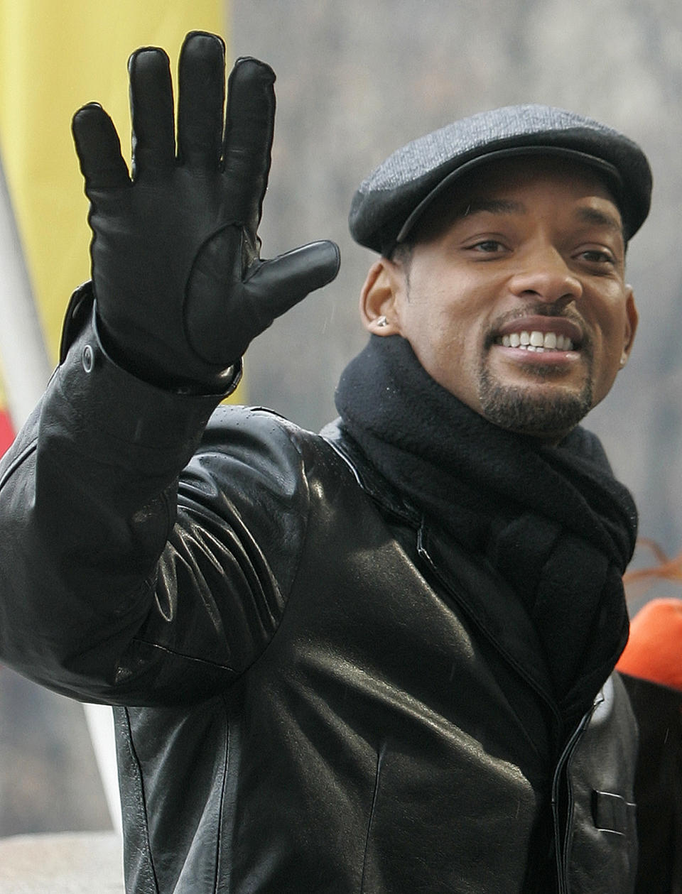 U.S. actor Will Smith poses on the balcony of the Teatro Real in front of the Royal Palace, seen in background, during a photo call to promote his latest movie "Seven Pounds" in Madrid Tuesday Jan. 13, 2009. (AP Photo/Paul White)