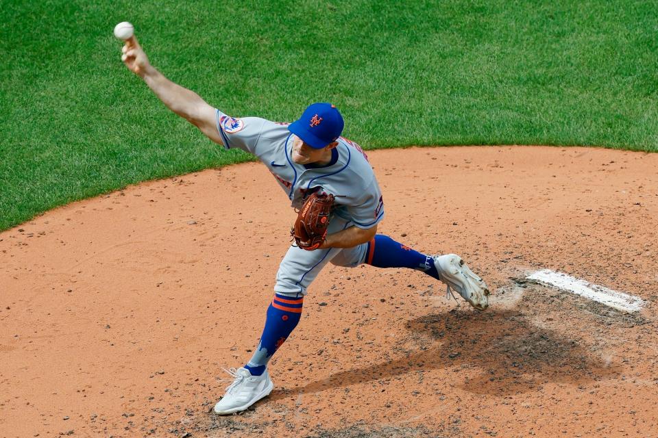 New York Mets' David Robertson pitches during the ninth inning in the continuation of a suspended baseball game against the Boston Red Sox, Saturday, July 22, 2023, in Boston. The game was suspended the night before due to heavy rain.