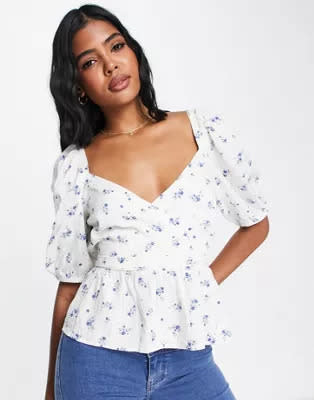 
New Look puff sleeve wrap peplum blouse in white floral
