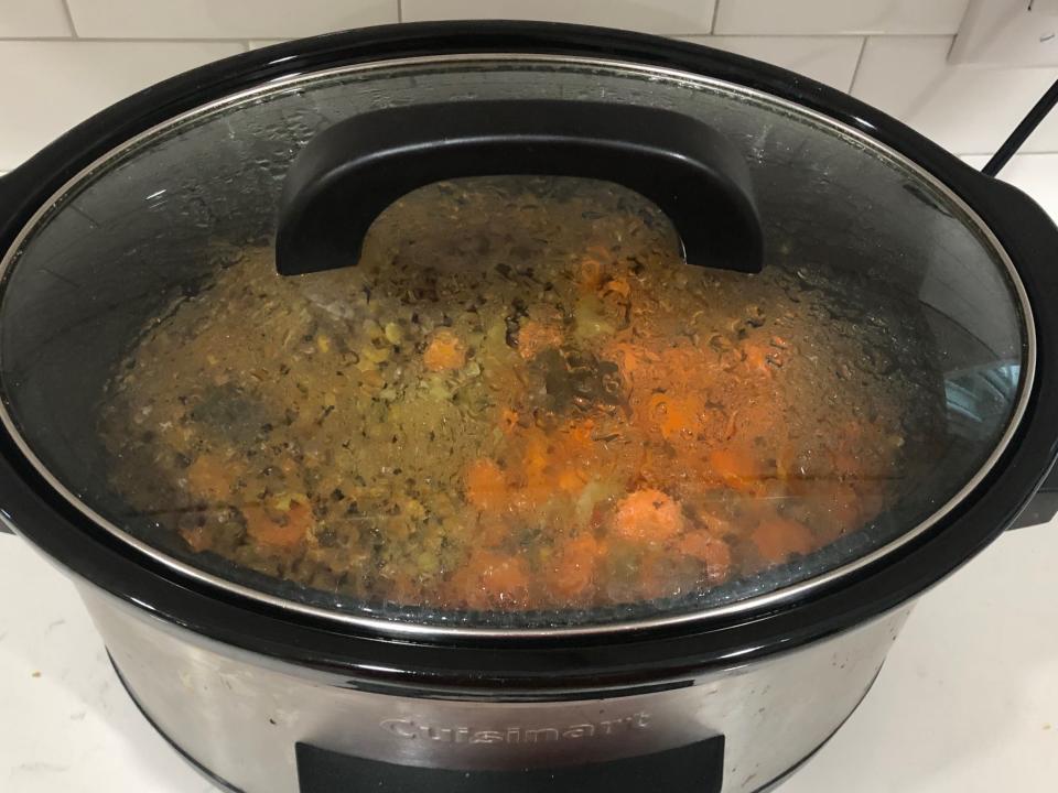 A Crock-Pot filled with split-pea and lentil soup.
