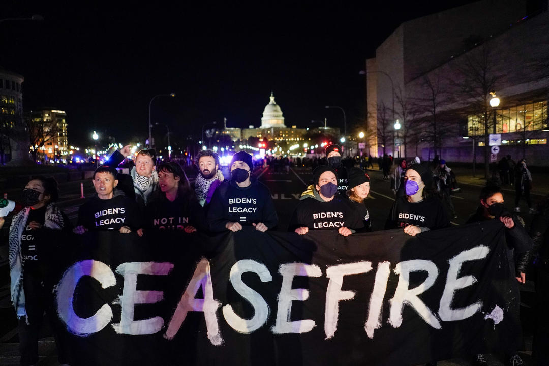 Demonstrators attempt to block President Biden's motorcade