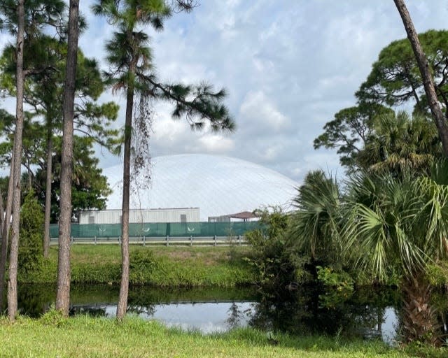 An air-supported dome went up at the site of TGL, a new tech-forward team golf league, on the Palm Beach Gardens campus of Palm Beach State College. The new league, developed by Tiger Woods and Rory McIlroy, is scheduled to begin play in January. The dome is nearly 250,000 square feet, and will hold close to 2,000 people. It is 75 feet high and covers almost the entire football field-sized athletic field at PBSC.