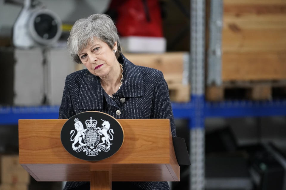 When previously giving speeches, Theresa May was always behind a podium and standing up, creating a barrier. Source: PA