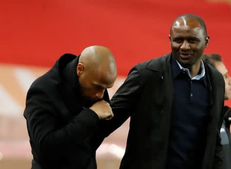 Soccer Football - Ligue 1 - AS Monaco v OGC Nice - Stade Louis II, Monaco - January 16, 2019 AS Monaco coach Thierry Henry and Nice coach Patrick Vieira after the match REUTERS/Eric Gaillard