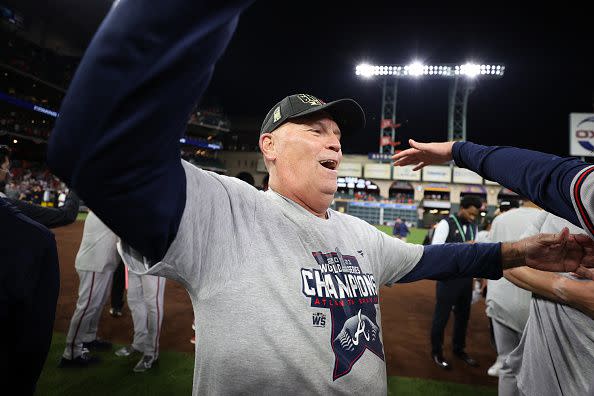 HOUSTON, TEXAS - NOVEMBER 02:  Manager Brian Snitker #43 of the Atlanta Braves celebrates the team's 7-0 victory against the Houston Astros in Game Six to win the 2021 World Series at Minute Maid Park on November 02, 2021 in Houston, Texas. (Photo by Elsa/Getty Images)