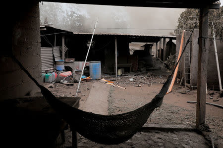 A hammock covered with ash hangs afters the eruption of the Fuego volcano in San Miguel Los Lotes in Escuintla, Guatemala, June 6, 2018. REUTERS/Carlos Jasso