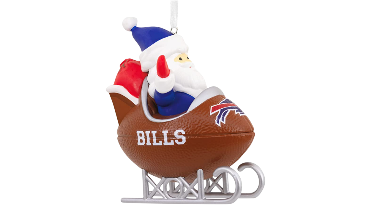 Santa in football sled with Bills logo in front.
