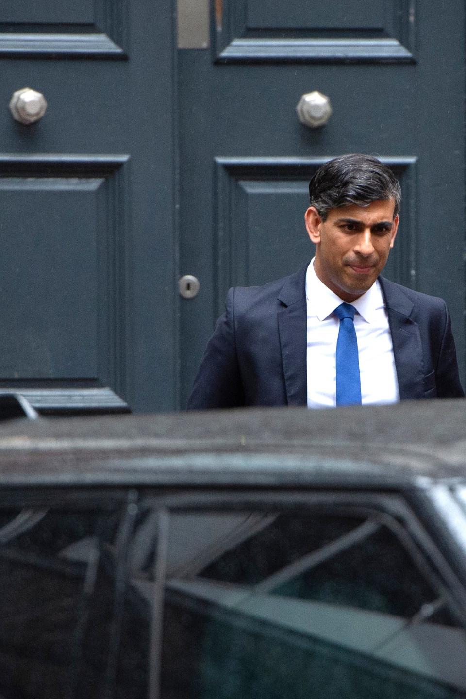 Rishi Sunak leaves the Conservative Campaign Headquarters in London after conceding defeat (AP)