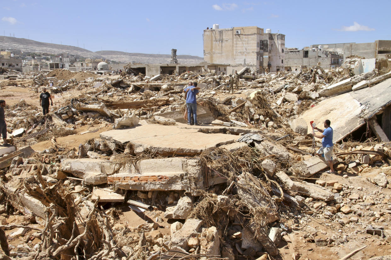 People look for survivors in Derna, Libya. Sept.13, 2023. (Yousef Murad/AP Photo)