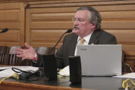 FILE - In this Thursday, May 21, 2020 file photo, state Rep. John Carmichael, D-Wichita, speaks during negotiations between the House and Senate over the final contents of a bill that would limit Democratic Gov. Laura Kelly's power to direct the state's response to the coronavirus pandemic, at the Statehouse in Topeka, Kan. “The power of the executive has been emasculated when it comes to the Emergency Management Act,” Carmichael says. “That may have very dire consequences in other circumstances and other disasters.” (AP Photo/John Hanna)