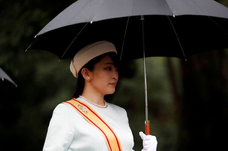 FILE PHOTO: Japan's Princess Mako arrives at the ceremony site where Emperor Naruhito will report the conduct of the enthronement ceremony at the Imperial Sanctuary inside the Imperial Palace in Tokyo