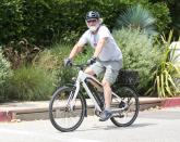 Kurt Russell goes for a ride in L.A. on Monday sporting a fully grown beard, cargo shorts and sneakers.