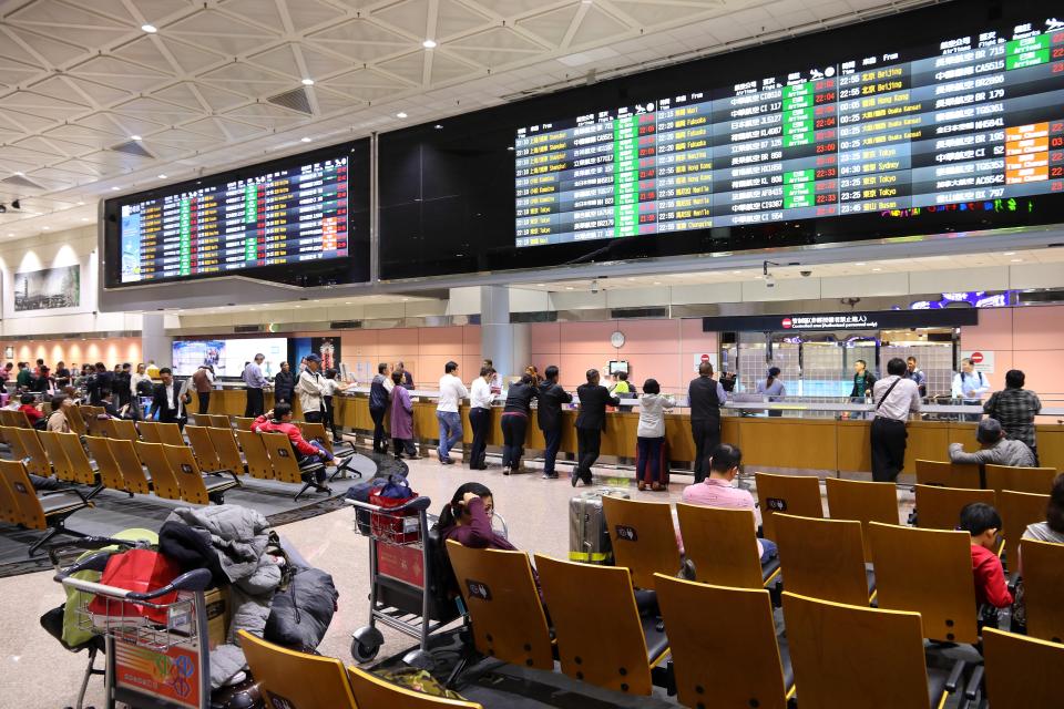 People wait at Taoyuan International Airport near Taipei, Taiwan. It is Taiwan's largest and busiest airport.