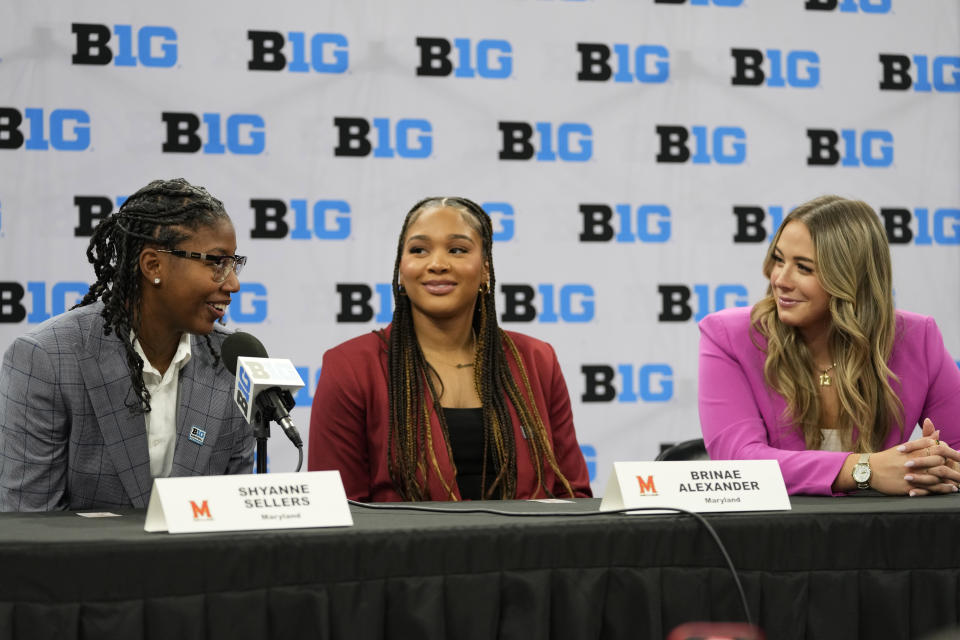 Maryland players Shayanne Sellers, left, Brinae Alexander, center, and Faith Masonius answer questions during Big Ten NCAA college basketball Media Days Monday, Oct. 9, 2023, in Minneapolis. (AP Photo/Abbie Parr)