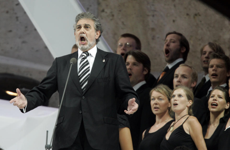 FILE - In this Sunday, July 9, 2006, file photo, Placido Domingo performs during the final of the soccer World Cup between Italy and France in the Olympic Stadium in Berlin. Eight opera singers and a dancer have told The Associated Press that they were sexually harassed by Domingo, one of the most celebrated and powerful men in opera. The women say the encounters took place over three decades, at venues that included opera companies where he held top managerial positions. (AP Photo/Luca Bruno)