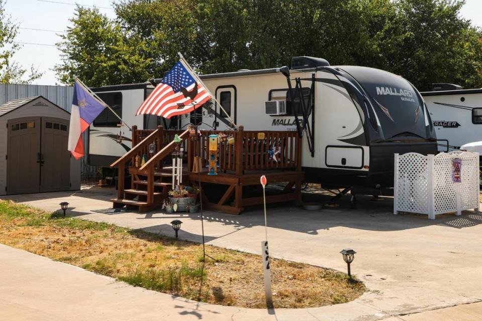 An RV with a porch and home decor at Gallagher Acres RV Park in Fort Worth on Wednesday, August 23, 2023.