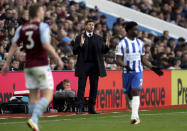 Aston Villa manager Steven Gerrard gestures during the Premier League match at Villa Park, Birmingham, Britain, Saturday Nov. 20, 2021.(Bradley Collyer/PA via AP)