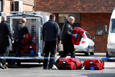 Inspectors from the Organisation for the Prohibition of Chemical Weapons (OPCW) arrive to begin work at the scene of the nerve agent attack on former Russian agent Sergei Skripal, in Salisbury, Britain March 21, 2018. REUTERS/Peter Nicholls